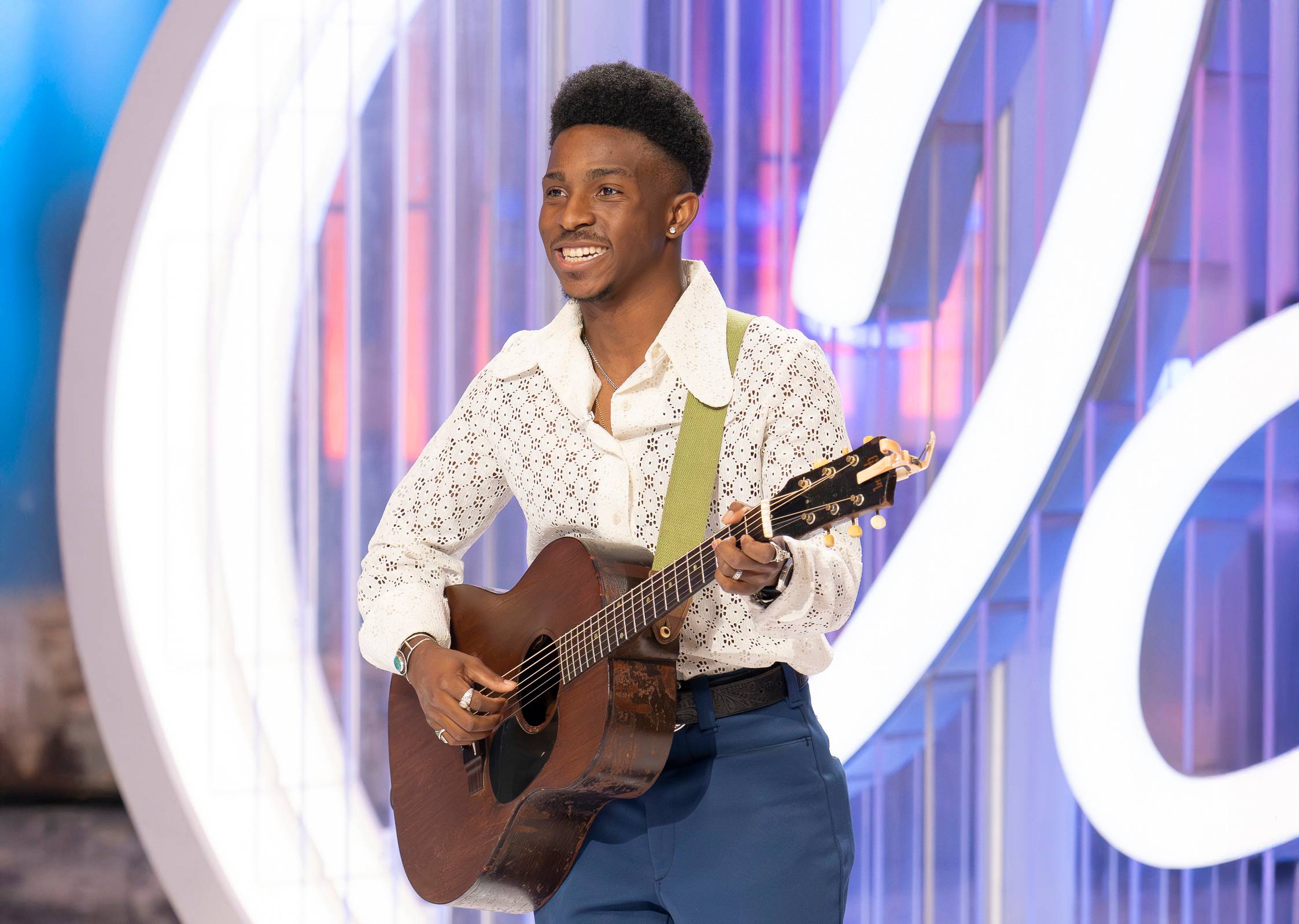 BARTLY performing onstage with a microphone