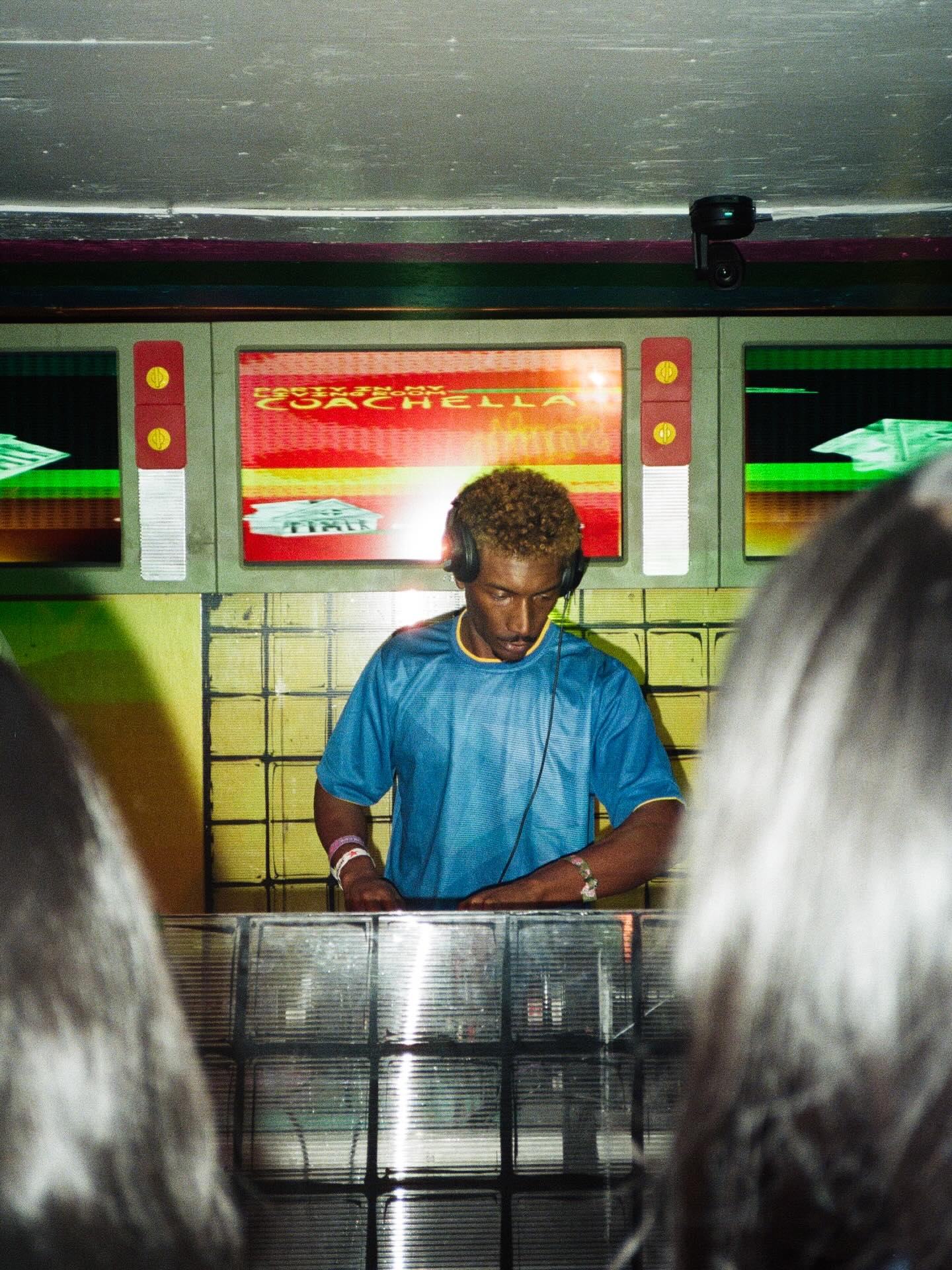 bLAck pARty DJing inside a restaurant