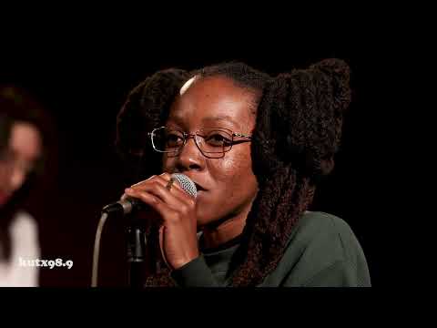 Blakchyl performing into a microphone at KUTX Studio 1A