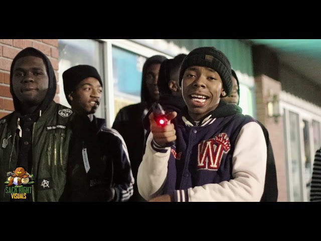 Gudda Gang members standing together outside in the Mo Action video