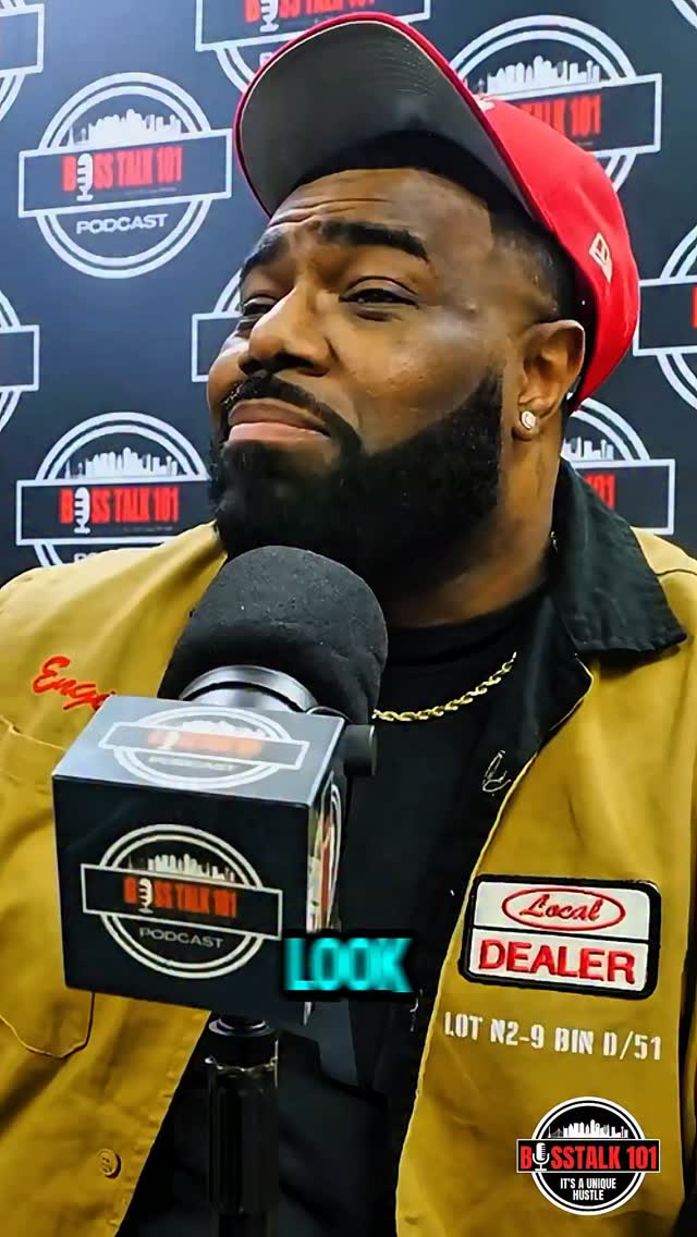 J. White Did It speaking into a microphone during a Boss Talk 101 interview