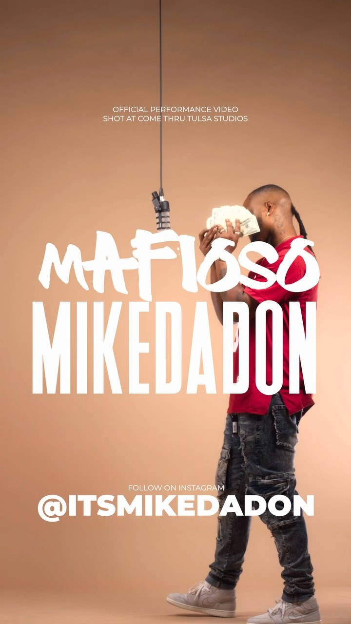 Mike Da Don performing into a studio microphone for Come Thru Tulsa