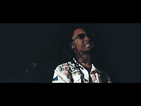 Neva Beena Rookie performing in a dark studio setting