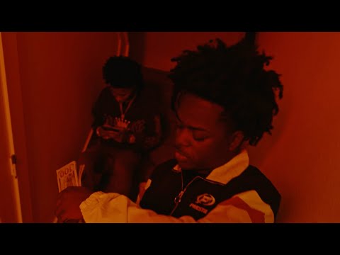 Quin NFN and BAK Jay performing in a red-lit room